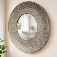 Round wall mirror with Moroccan-inspired antique gold patterned frame. Perfect for hallways and living rooms