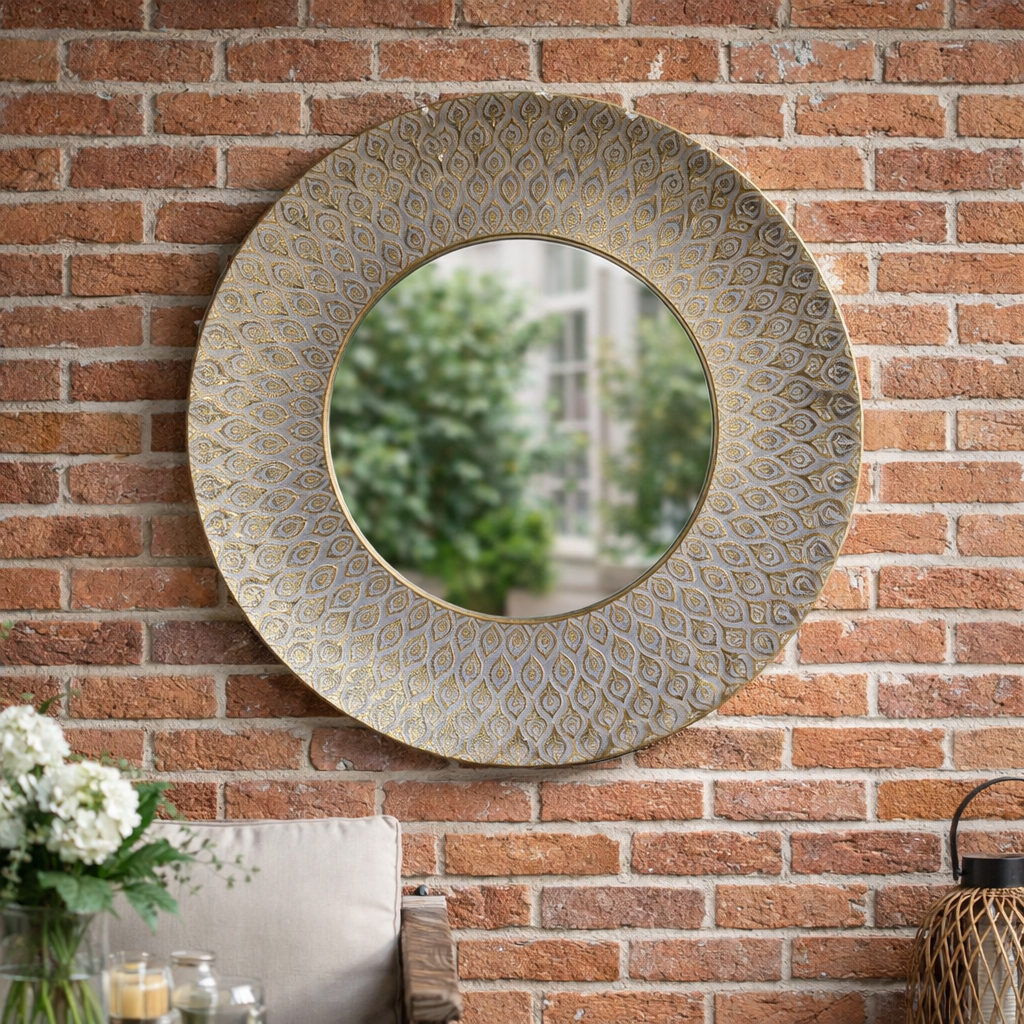 Mirror on a brick wall in a conservatory setting, 