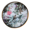 Gorgeous, round tray with a gilt rim. A luxurious look and ideal home gift.
Bring a touch of the exotic to your home with this vibrant Tropical Flamingo &amp; Monkey Tray. Measuring 40cm in diameter, this round tray features a stunning jungle-inspired design with a playful pink flamingo, monkeys, and lush botanical foliage in rich greens, purples, and soft pastels. Crafted with a high-gloss finish and bordered with a sleek gold rim, it’s as practical as it is eye-catching. Ideal for serving drinks, displayi
