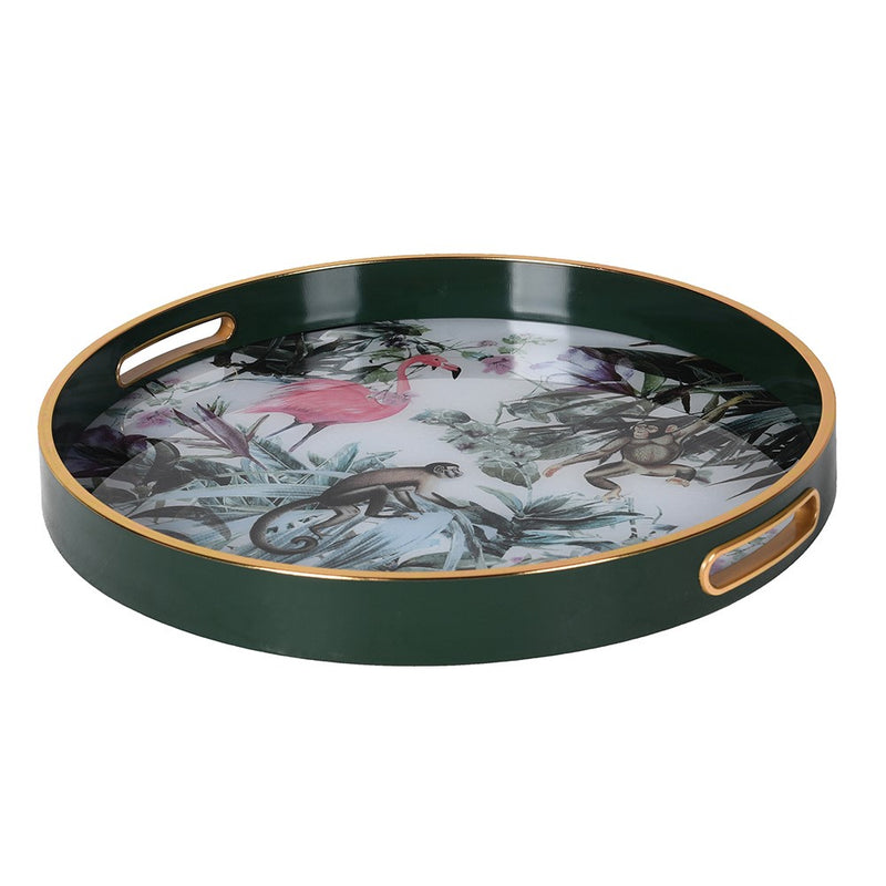 Gorgeous, round tray with a gilt rim. A luxurious look and ideal home gift.
Bring a touch of the exotic to your home with this vibrant Tropical Flamingo &amp; Monkey Tray. Measuring 40cm in diameter, this round tray features a stunning jungle-inspired design with a playful pink flamingo, monkeys, and lush botanical foliage in rich greens, purples, and soft pastels. Crafted with a high-gloss finish and bordered with a sleek gold rim, it’s as practical as it is eye-catching. Ideal for serving drinks, displayi