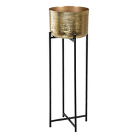 A very tall glamorous gold metal plant stand on tall slender black iron legs which will brighten and lift your patio or garden area. The gold metal plant pot is a useful 30cm diameter and the plant stand finishes at 94cm tall lending elegance and stature to any greenery, foliage or flowers you choose to plant in it. 