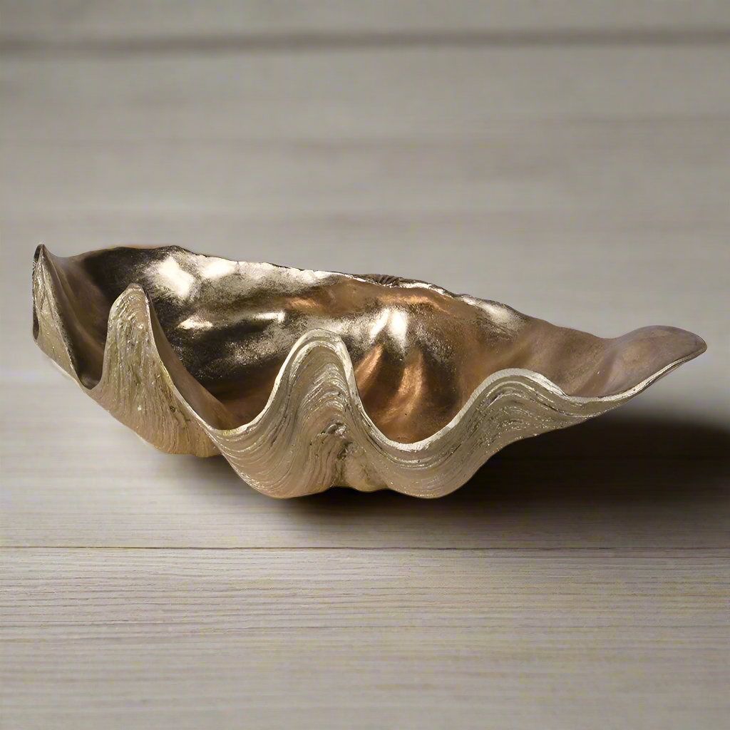 Gold resin shell bowl, stunning accessory for a bathroom or any room that needs a touch of gilt glamour. Gold resin shell bowl, stunning accessory for a bathroom or any room that needs a touch of gilt glamour.