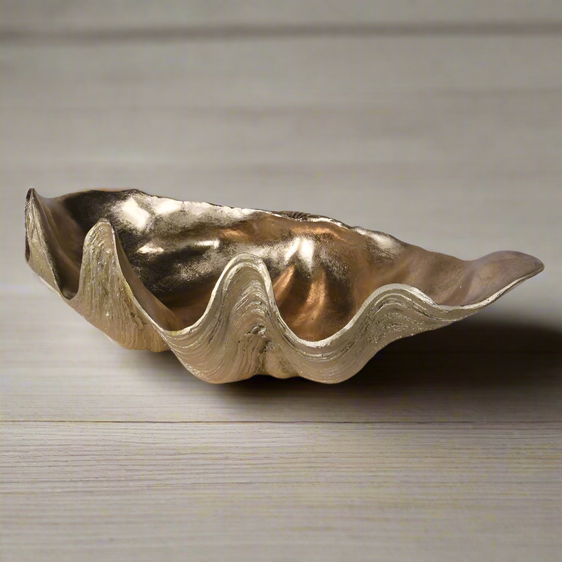 Gold resin shell bowl, stunning accessory for a bathroom or any room that needs a touch of gilt glamour. Gold resin shell bowl, stunning accessory for a bathroom or any room that needs a touch of gilt glamour.