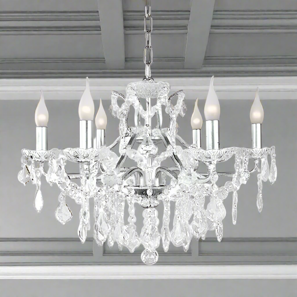 Six-arm brushed silver chandelier with crystal droplets and shallow basket design, suitable for low ceilings.