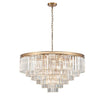 This six-tier crystal chandelier is designed to make a bold, unforgettable statement in any room. Its polished gold band supports cascading layers of prism-cut crystals