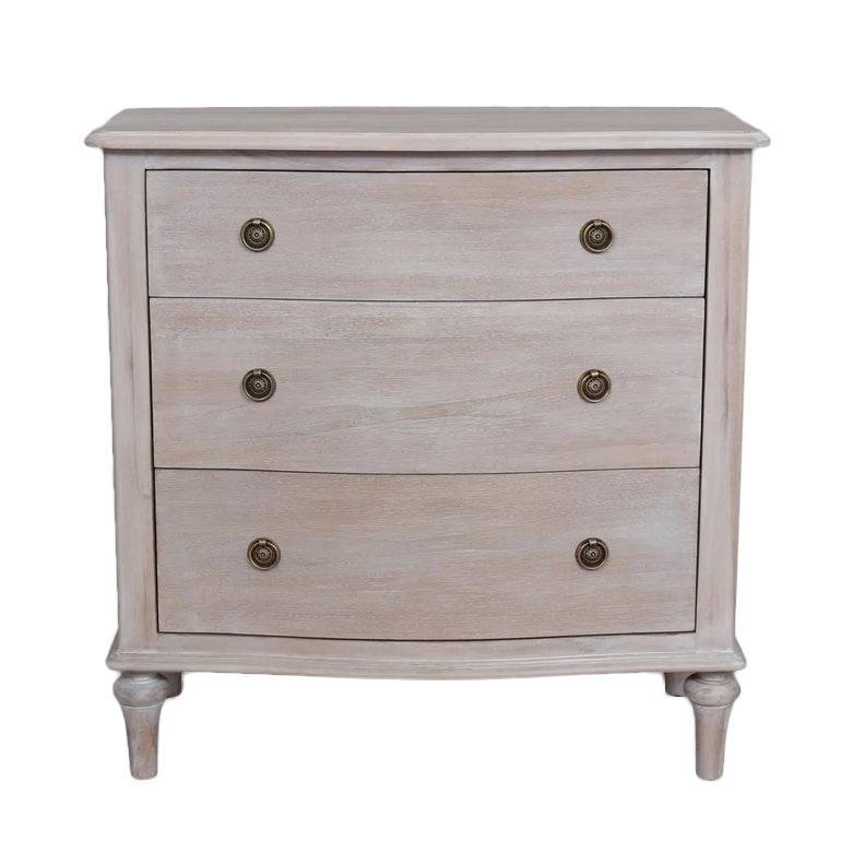 Soft off white wooden three drawer chest with brass knobs, elegant storage solution, ideal for living rooms and bedrooms.