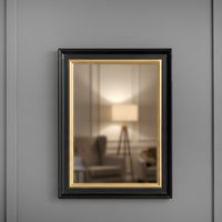 The simple, black and gold 40cmx30cm rectangular mirror, perfect for a smaller room