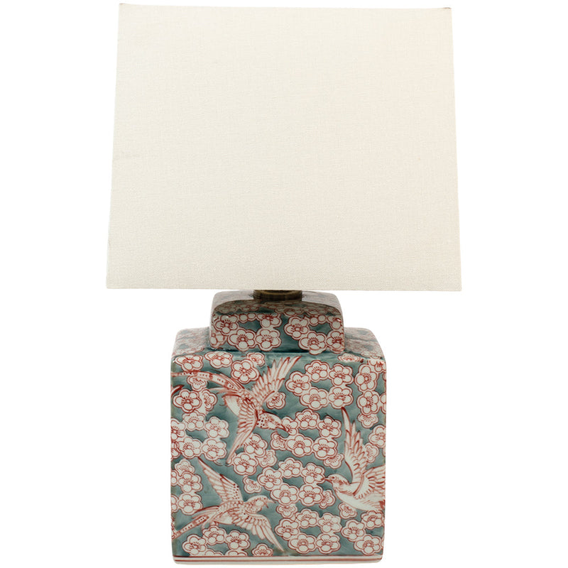 A delicate fauna and flora sage green and red ceramic lamp base with a white linen shade.&nbsp; Small enough to use as bedside lamps or as a small side lamp where your space will be transformed into a cosy area.&nbsp; The white linen shades diffuses ample light on this ceramic lamp and you can choose from our recommended bulbs below to get the colour temperature right for your room. We have a wide range of ceramic lamps on our site for your to choose from, all colours and sizes.