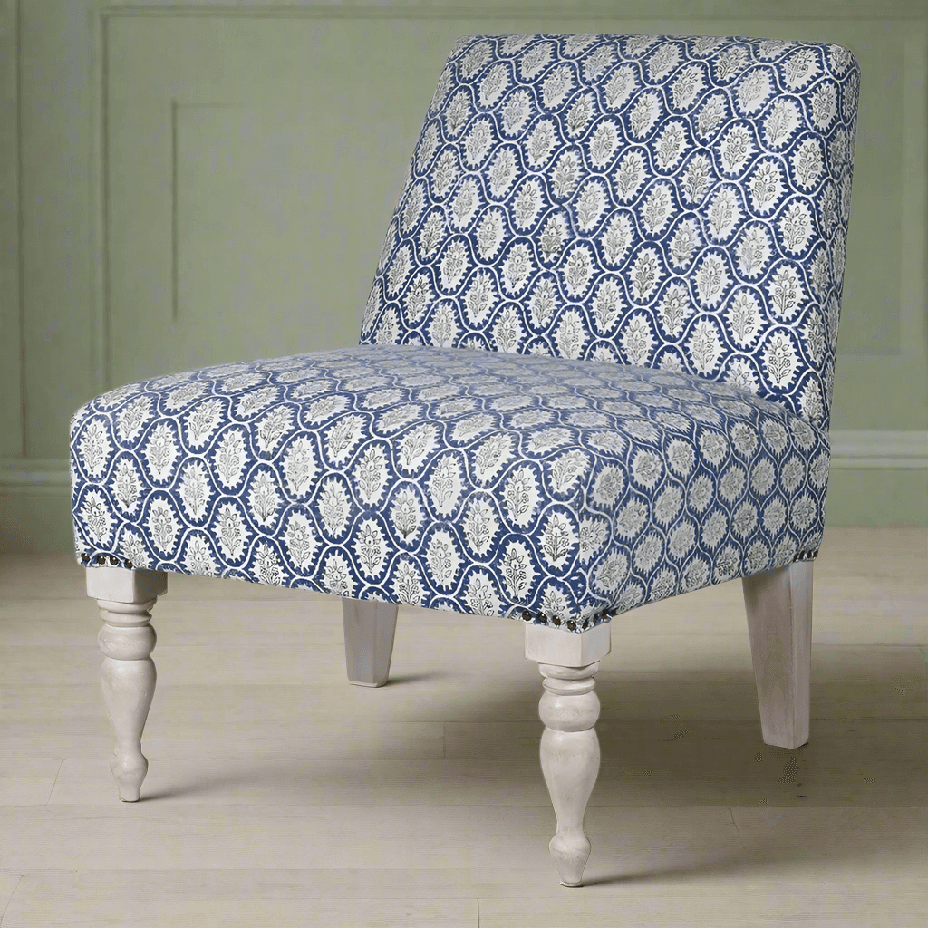 A blue and grey paisley cotton fabric chair with limewashed turned legs. A really pretty occasional chair which will pop in any interior. The colour would work in most modern and period himes, to brighten a corner in a bedroom or living room where extra seating is always a bonus. 