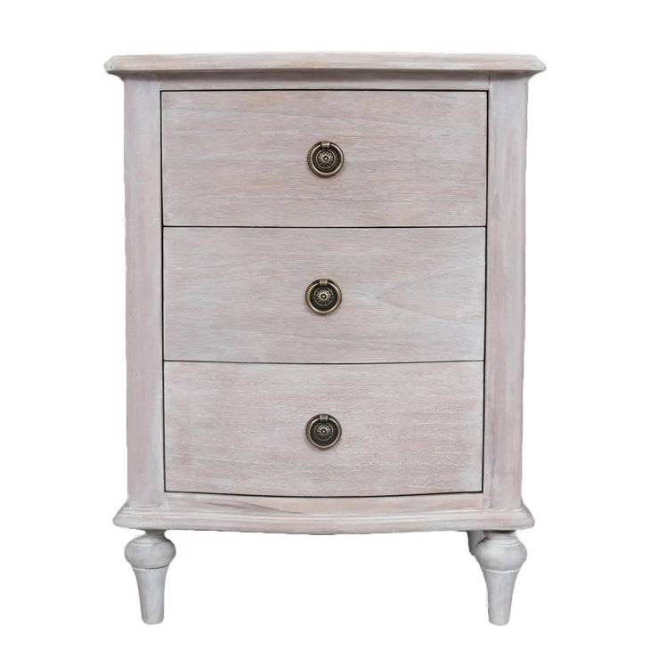 A solid hardwood three draw bedside table made from bleached mahogeny wood with ash veneers in a white wash finish. 