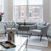 Elegant and super comfortable armchair in a pinstripe fabric.&nbsp; Perfect country house armchair but chic enough for the most contemporary of town house settings. The finely textured pattern in a neutral tone, gives a sophisticated and versatile look. The slightly tapered wooden legs refine that look. This is a substantial piece of furniture which will suit regular use in your busy living room or in a bedroom, lounge or anywhere in the home.&nbsp; A striped armchair that would work everywhere .