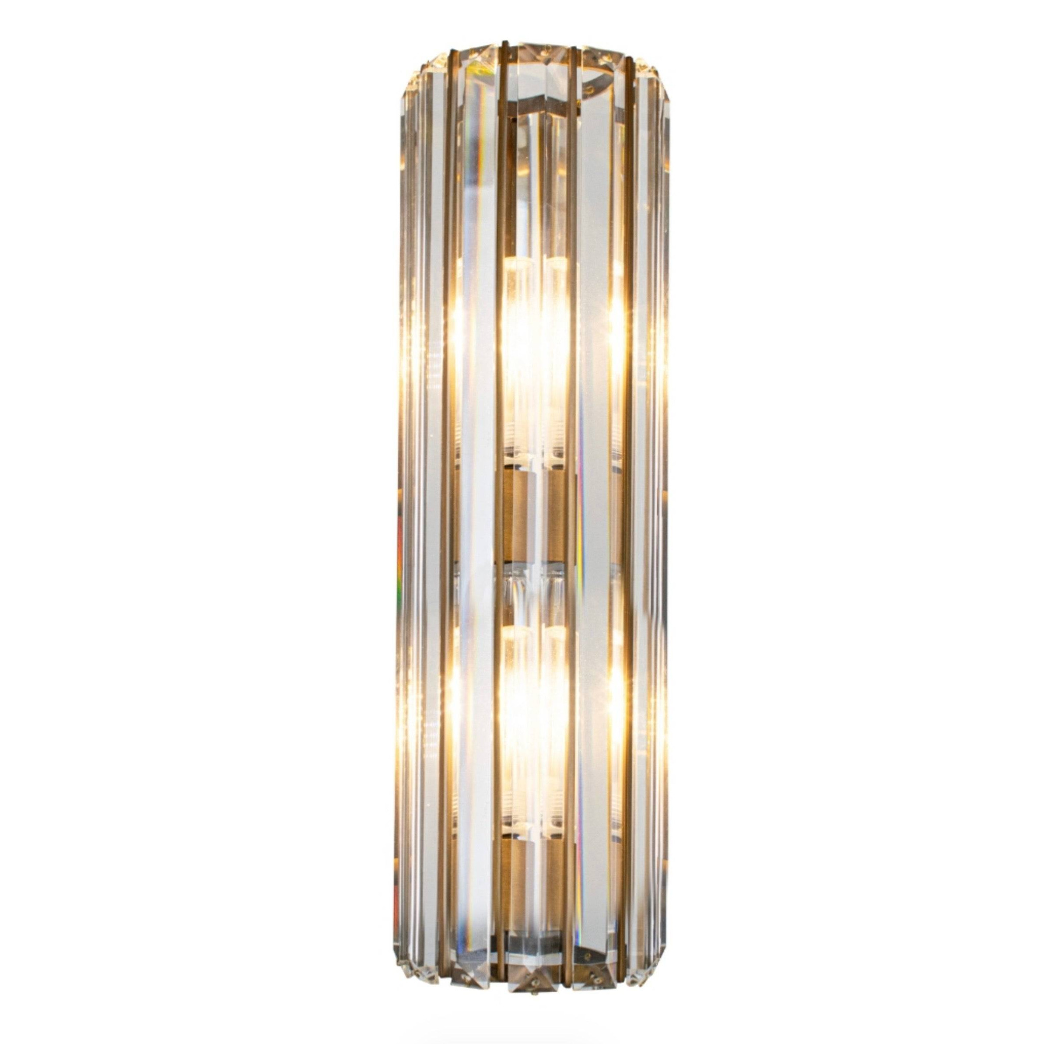 Long crystal prism wall light, single set on white background.