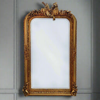 Beautifully ornate large ornate gilt wood wall mirror.The gold frame is decorated, in the Georgian style with musical instruments, swags and other embellishments. Exceptionally ornate frame of large dimensions, perfect in a period country house, or an elegant town home. The addition of a mirror of this quality to a room immediately conjures up a luxurious air to a home.