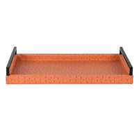 A burnt orange coloured faux leather tray with long black metal handles to each end. A particularly smart, high end look. Acessories, such as trays just add warmth and sophistication to your interior. The earthy, warm colour of this particular tray will pop in any setting.