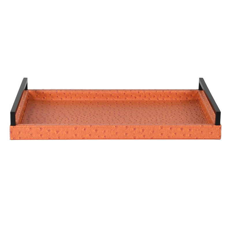 A burnt orange coloured faux leather tray with long black metal handles to each end. A particularly smart, high end look. Acessories, such as trays just add warmth and sophistication to your interior. The earthy, warm colour of this particular tray will pop in any setting.