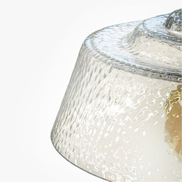 Textured glass pendant, wide shade set on a brass holder, chain and rose. The glass shade is wide enough to spread light in your kitchen, dining area or in your hall.