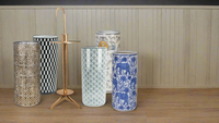 Tall lattice brass coloured umbrella stand, a really chic item for your hallway. Pierced metal gilt coloured stand, suitable for any hall to add a touch of grandeur.

H: 55 cm D: 23 cm