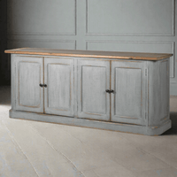 It's the perfect addition to your period home. Its distinctive distressed grey blue finish and old pine surface give it a sense of history and character. This sizeable sideboard offers ample storage, including adjustable shelving. It's a versatile piece that works beautifully in the kitchen, dining room or living room. With rustic, charming appeal, this sideboard is a great choice for a period setting.