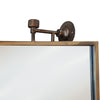 Perfect bathroom or wall dressing table mirror. A brass and bronze framed swivel mirror which can be hung vertically or horizontally. This mirror has metal work that has bronze and black distressed paintwork to the finish adding to it's overall industrial feel.