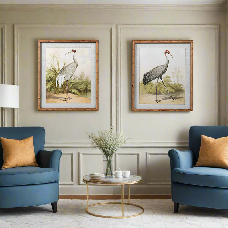 Pair of medium sized stork prints in a wooden faux bamboo frames. A pair of large prints always has a great impact on any wall. These would work in any interior.