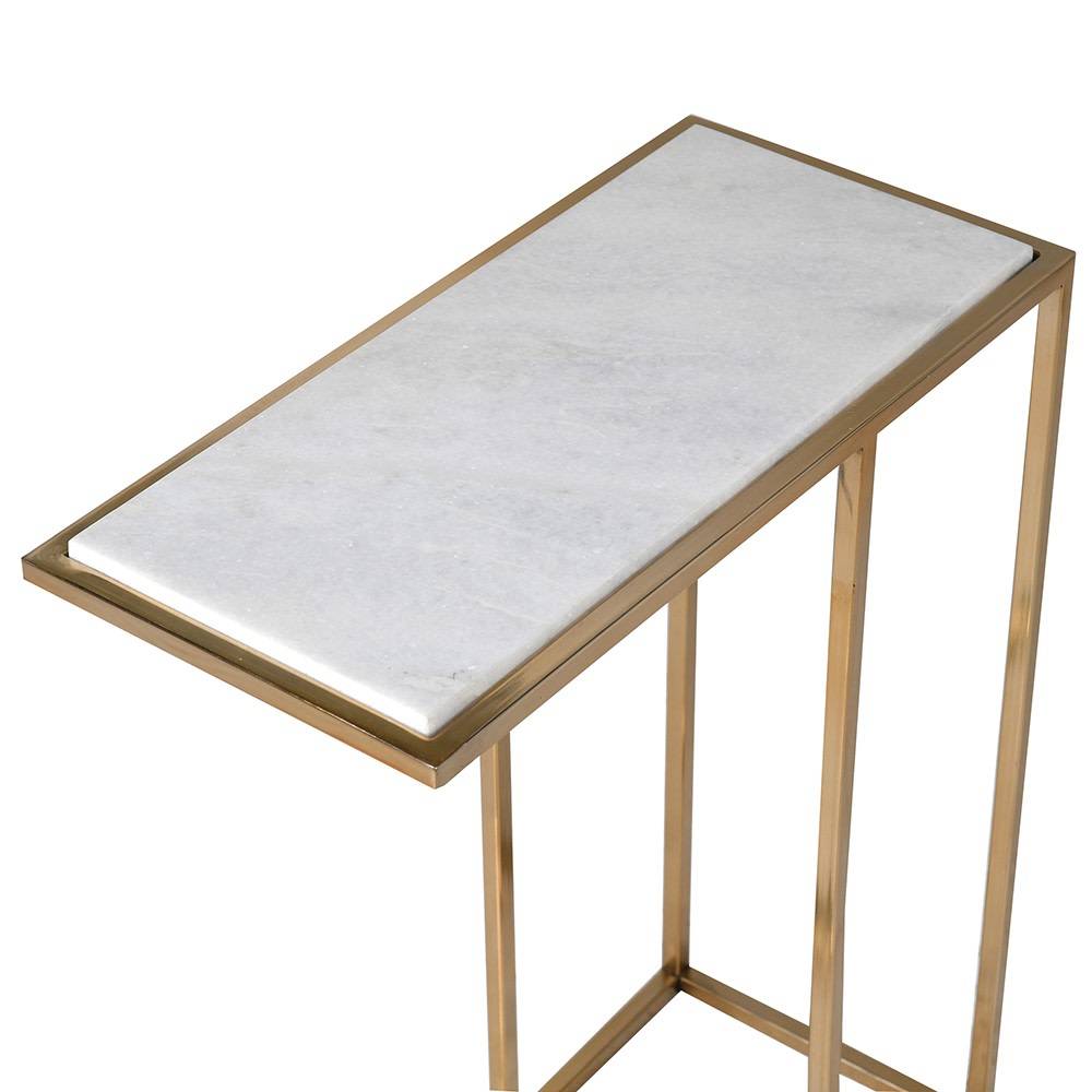Modern side table with a white marble top and brushed gold metal frame, designed to slide under a sofa. Perfect for compact spaces and stylish decor.