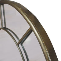 Close up of arched window mirror on a white background.