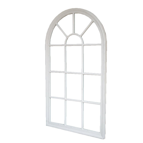 A tall, white painted wooden arched window mirror, these mirrors fool the eye adding light and depth to any room.