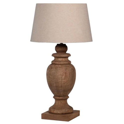 Huge, statement wooden lamp base with neutral linen shade.