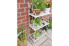 3 tier white folding shelf, great indoors or outdoors. With plants or books, this versatile little shelf can be placed anywhere, in any room, or folded neatly away when not in use.