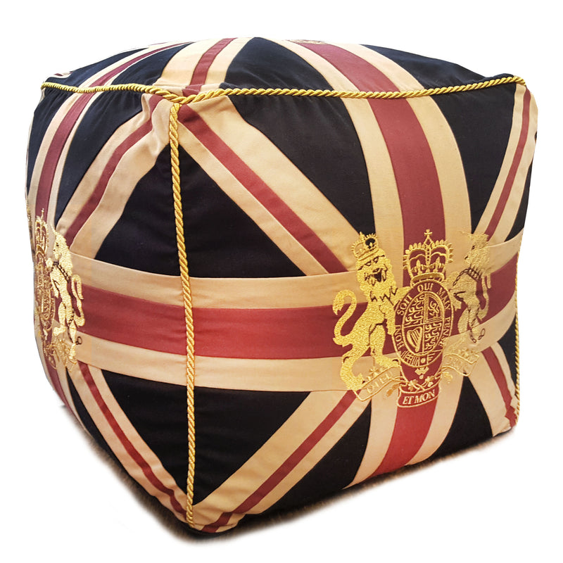 A Union Jack crested cube pouffe.&nbsp; This stool is structured with a firm seat and great as an extra seat or footstool.   Cover: 100% Cotton  Insert: Polyester   H: 46 cm W: 46 cm D: 46 cm