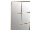 A nine pane square window mirror in a gold painted metal.