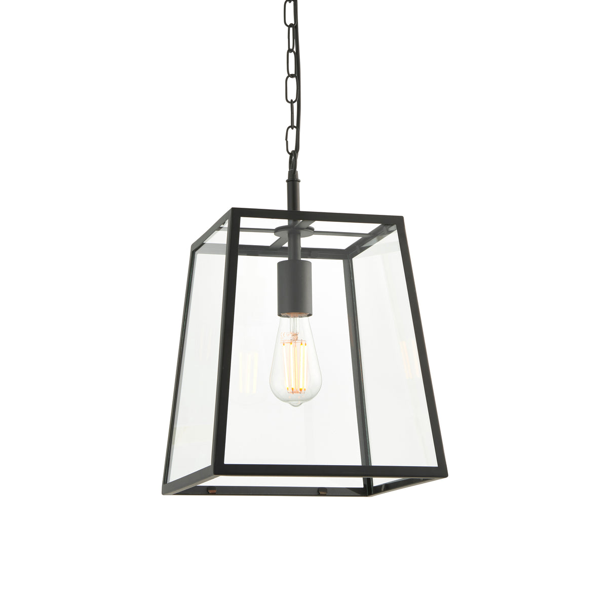 Black trapezoid shaped glass lantern, perfect hall or porch light. It has an industrial twist that suits a period house or the most contemporary interior.