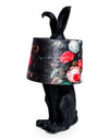 A quirky matt black rabbit lamp with, set off beautifully by a retro style black and red floral shade.  H: 70 cm W: 36 cm