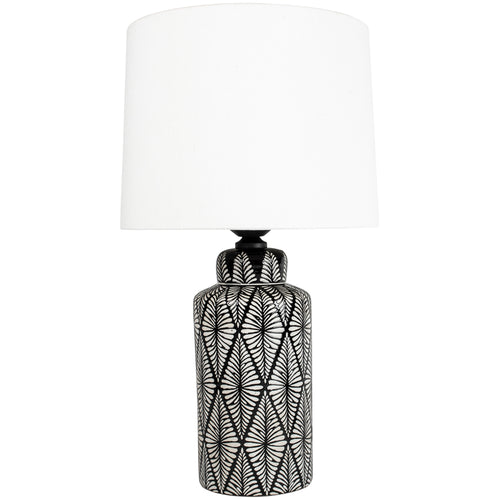 Geometric patterned black and white ceramic lamp with a bright white linen shade, a really fresh take on the classic blue and white lamp. 