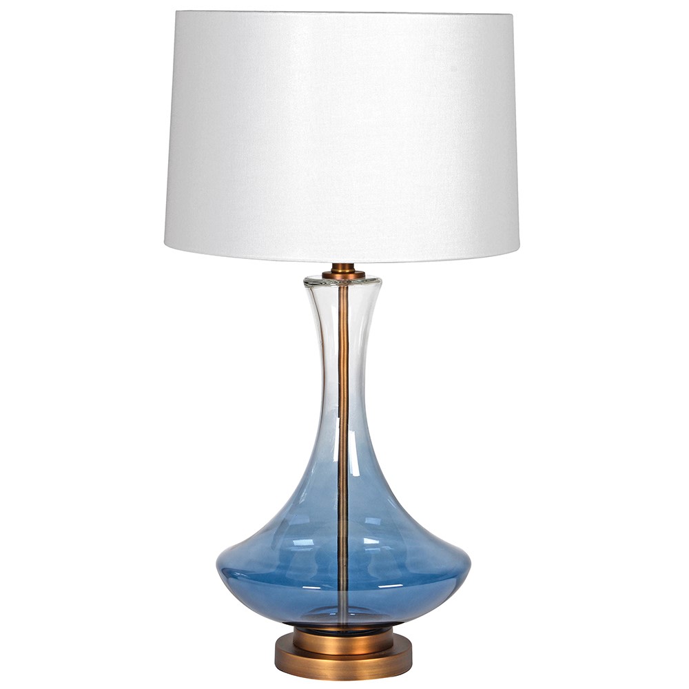 Glass ombre coloured lamp base with a darker blue base fading to clear nearer the white shade. The lamp is centred onto a gilt base. Classic contemporary look.Blue Glass Table Lamp