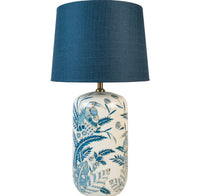 A beautiful vintage blue ceramic lamp base with exotic bird floral design.&nbsp; This lamp comes with a smart dark blue linen lamp shade included.&nbsp; A stylish look for a classic country home.  H: 70 cm W: 38 cm