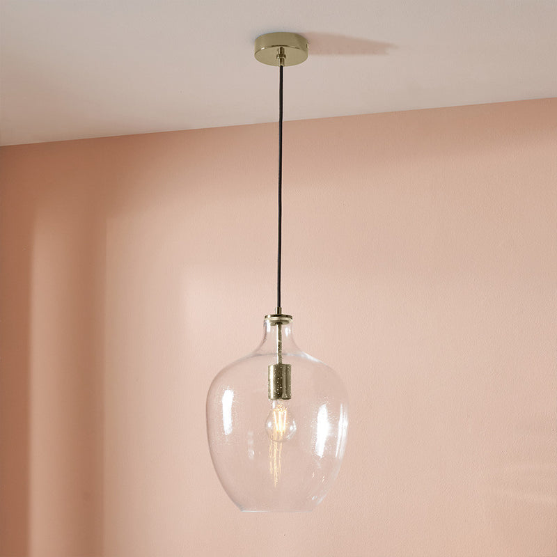 Glass pendant with subtle bubble effect to the glass and pale gilt metal accents. Large enough for any room giving a stunning glow when teamed with a filament bulb.