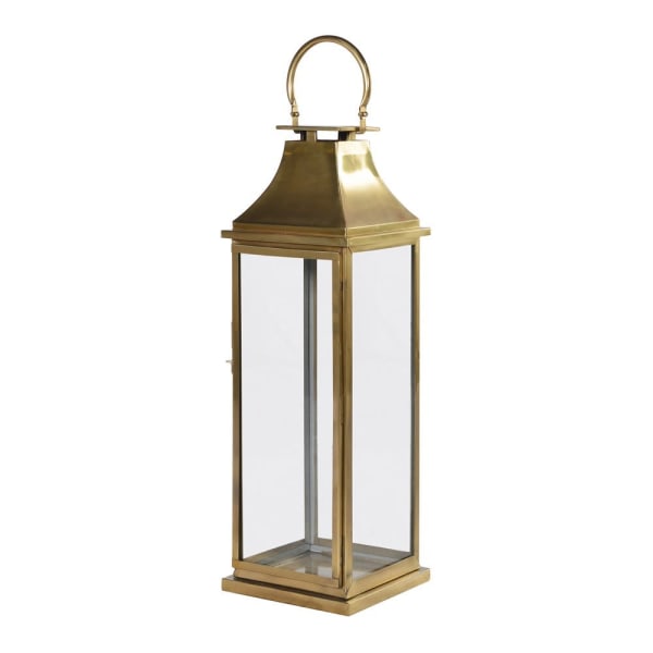 This brass lantern has an exceptional height tall enough to place on the floor.&nbsp;&nbsp; Place large church candles inside or fill with battery operated fairy lights to give your space an instant glow.&nbsp; A superior product to elevate your home and entertaining space.