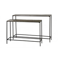Sleek and sophisticated, this set of bronze-topped console tables pairs a warm metallic finish with minimalist black steel frames for a refined industrial look. The nesting design offers flexible styling — use together for layered depth or separately across your home. Perfect for entryways, living rooms, or modern interiors, these tables bring timeless elegance and functional versatility to any space