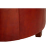 Large round leather stool.