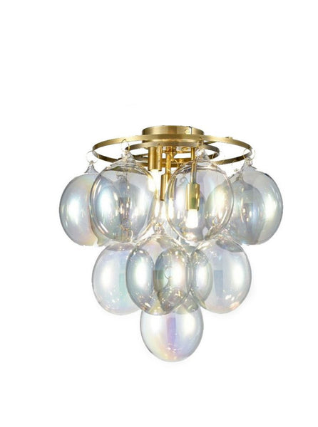 Iridescent glass bubble light on a brushed brass metal ring. At last a statement flush light - beautiful coloured light.