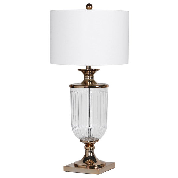 Exceptionally beautiful glass urn shaped lamp with antique brass meytal mounts and white fabric shade. A classic, timeless style.