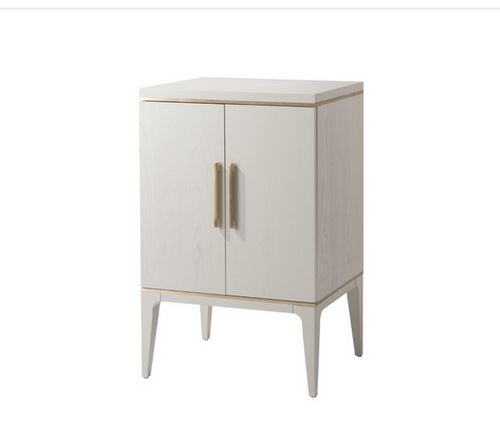 A stylist light grey veneer, glass covered cabinet trimmed with an antique brass finish. Subtle pale colouring give this piece a very high end feel.