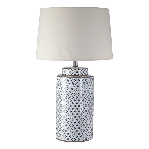 A totally classic blue and white ceramic lamp base and linen shade.
