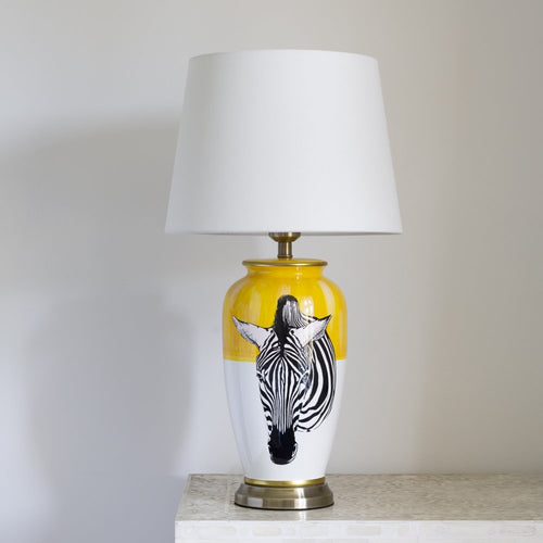This beautiful zebra ceramic table lamp in yellow & white would suit any cool contemporary interior.
