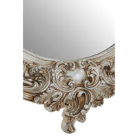 Classic ornate oval mirror with a champagne finish.