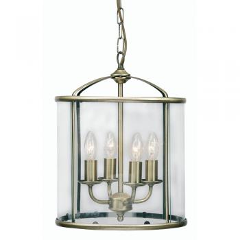 Traditionally shaped lantern in an antiqued brass finish with 4 lights, perfect country house on town house hall light.