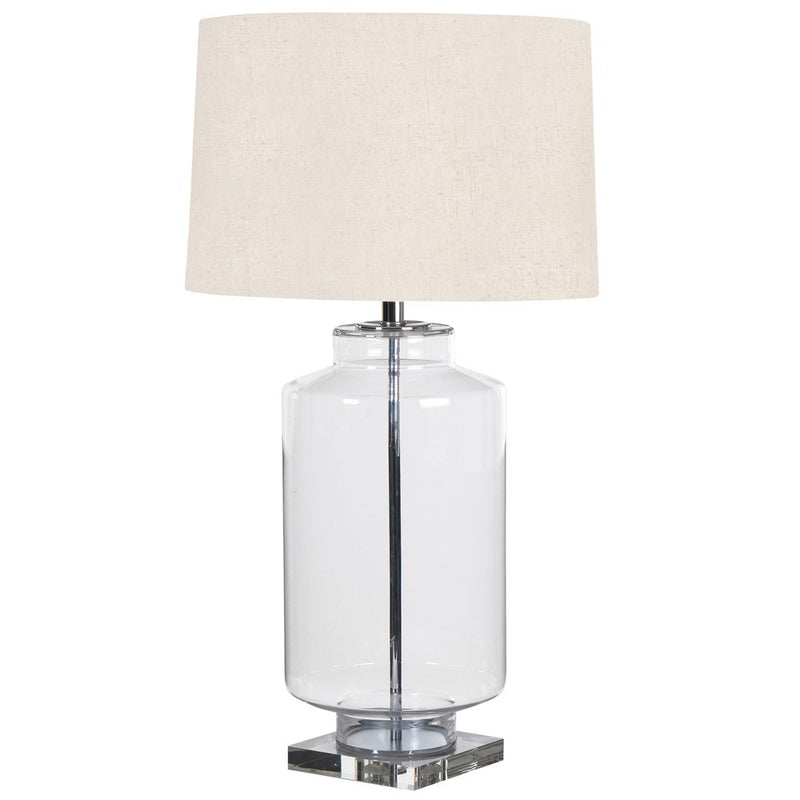 A large clear glass statement lamp on marble base plinth.&nbsp; This is a striking piece which will emit a lovely light as a side or corner table lighting, or on a very large console or hall table. 