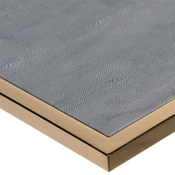 Sofa table in faux shagreen and brushed gold metal, made to slide under a sofa. Tables in this shape are perfect space savers and in this fabrication adding glamour to any room. Exceptionally stylish in the green shagreen and brushed gold, a combination that adds a touch of luxury to any interior.