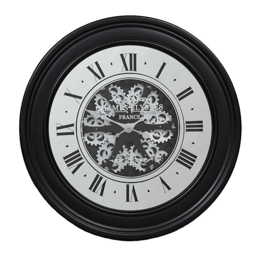 A silver mirrored front, moving cog clock set in a black metal case, a total statement. The glass front having 'Champs Elysee' in silvered lettering.